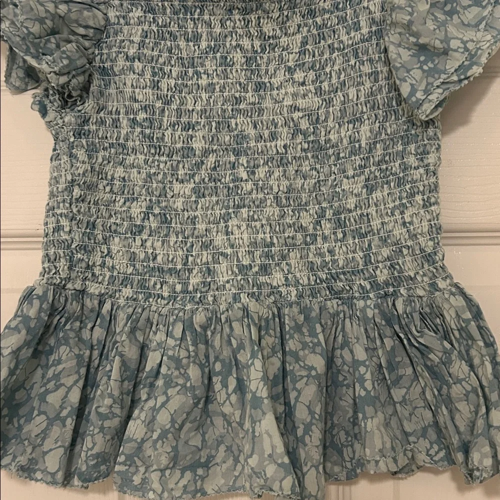 Love the Label Anthropologie Blue Flutter Sleeve Smocked Peplum Blouse